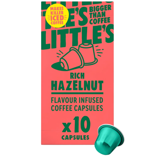 Box of Rich Hazelnut Flavour Infused Coffee Capsules with a green coffee capsule on a white background